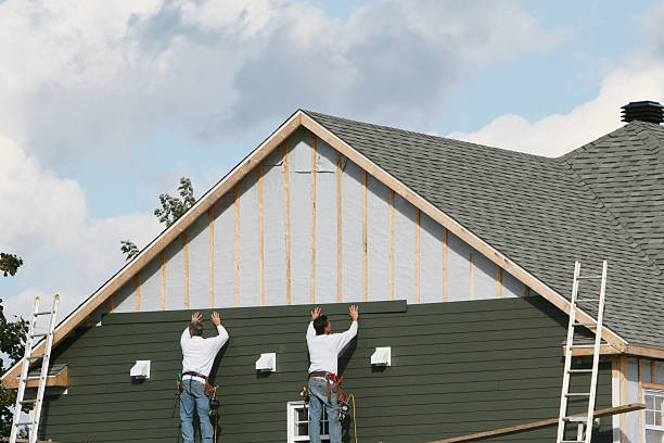 Professional Siding technician working in Milton, NY